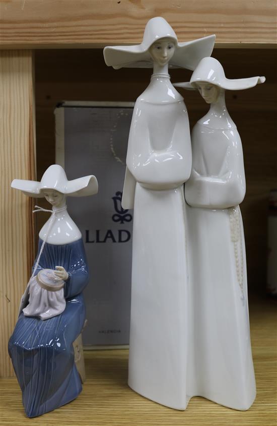 A Lladro figure, Time to Sew (Blue), boxed and another of two nuns tallest 33cm